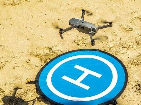 146181091-drone-landing-to-the-landing-pad-on-the-sand.jpg.67a90d1a365d88bc722eb074c6b55655.jpg