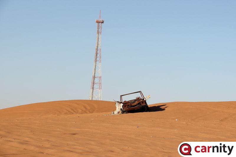4. Faya Car Wreck and Tower.JPG
