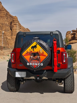 Custom spare tire cover fitted to an off-road vehicle